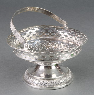 An Indian silver swing handled basket with pierced decoration 5 1/2", 196 grams 