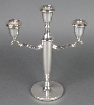 A silver 3 light candelabrum of plain form 10 1/2", Birmingham 1962 