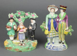 A 19th Century English porcelain group of a standing lady  and gentleman carrying baskets 7", a ditto of a Bocage group with vicar, couple and child 5" 