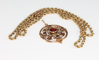 A 9ct gold rope link necklace together with a 9ct garnet set pendant 10 grams