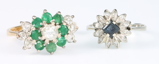 An 18ct yellow gold emerald and diamond cluster ring size N, a sapphire and diamond ditto size H 