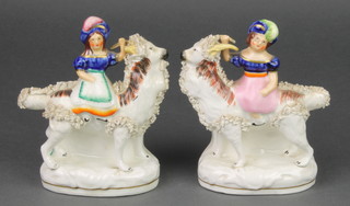 A pair of Victorian Staffordshire figures of ladies standing on giant goats 6" 