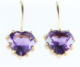 Two 9ct gold gem set pendants and a pair of 9ct yellow gold amethyst earrings 