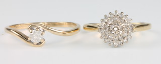 A 9ct yellow gold single stone diamond ring size S, an 18ct yellow gold diamond cluster ring size L