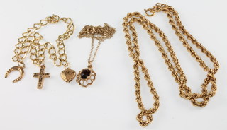 A 9ct yellow gold rope twist necklace, a ditto charm bracelet and a pendant and chain 12 grams
