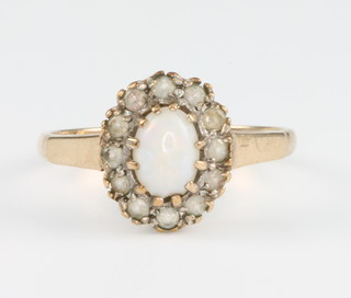 A 9ct yellow gold opal cluster ring size O