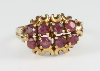 A 9ct yellow gold garnet ring size L