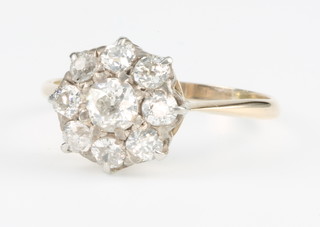 An 18ct yellow gold diamond cluster daisy ring size R