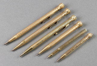 A Life Long gold plated propelling pencil and 5 others