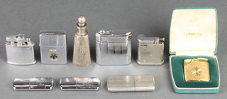 A lady's gilt Ronson cigarette lighter boxed and 8 other lighters