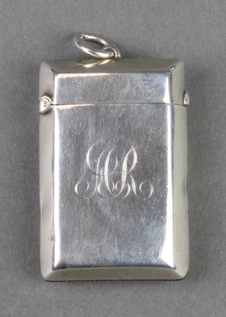 An Edwardian silver vesta with chased monogram Chester 1904 26 grams