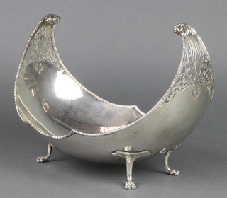 A silver boat shaped bowl with pierced decoration on claw feet, Sheffield 1923, 734 grams 11" 