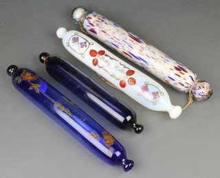 A 19th Century blue glass rolling pin decorated with flowers 15", a ditto 12 1/2", a polychrome ditto 16" and a white ditto 14 1/2" 