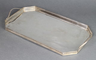 An octagonal silver galleried 2 handled tray London 1913 16" x 8 1/2", 1018 grams