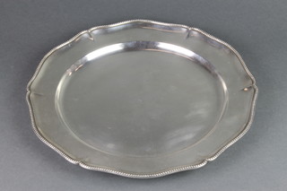 A Continental silver salver with pie crust and beaded rim 14", 1316 grams