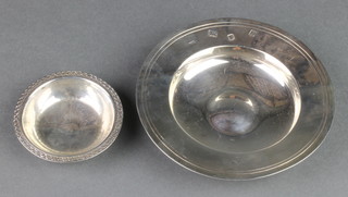 A silver Armada dish London 1957, a Continental nut dish, 136 grams