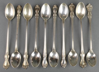 A set of 10 Sterling silver cocktail spoons with fancy handles, 336 grams