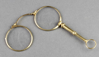 A pair of 19th Century gilt lorgnettes 