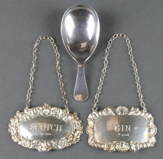 A silver caddy spoon of plain form Sheffield 1926, 2 modern silver spirit labels 