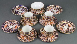A Royal Crown Derby Japan pattern part coffee set comprising 4 coffee cups, 3 saucers, 6 small plates and a sugar bowl 