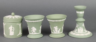 A Wedgwood green Jasperware candlestick decorated with figures 5", 2 ditto vases and a lidded jar