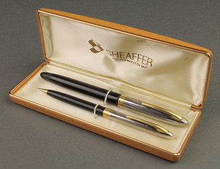 A Sheaffer fountain pen with 14ct gold nib and matching propelling pencil boxed