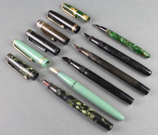 A pale green Conway 57 fountain pen, green marbled Croxley, Conway Dinky 560 (lacking lever), a Quarterman's 513, black Pitmans College and 1 other