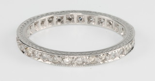 A white gold full eternity ring, approx 0.5ct, size O 1/2