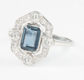 An Art Deco style sapphire and diamond up-finger ring, the sapphire approx. 1.15ct, the diamonds approx. 0.55ct, size O