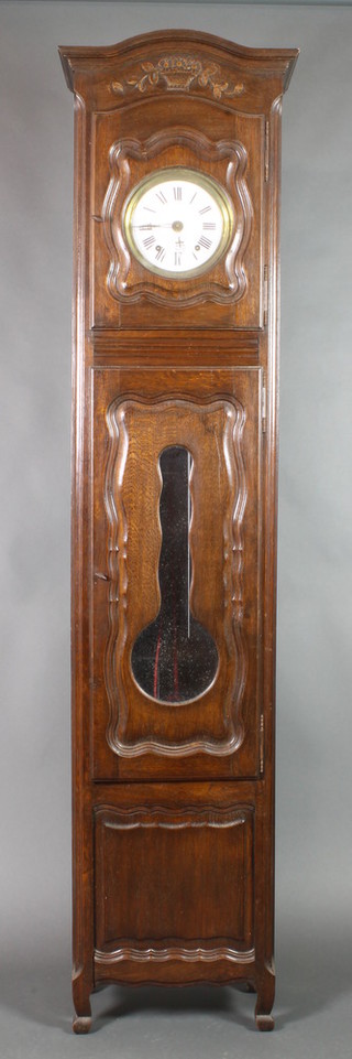 A 19th Century French striking comtoise longcase clock with 8" enamelled dial, striking on bell, contained in a carved oak case 92" 