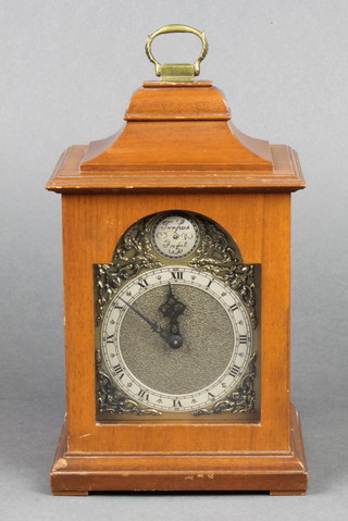 Rotherham, a Georgian style bracket clock with 3 1/2" arched gilt dial and silvered chapter ring, contained in a shaped mahogany case  