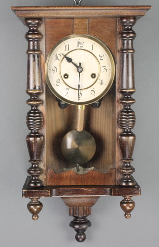 An American Clock Company striking Vienna style regulator with a 5" dial, contained in a mahogany case