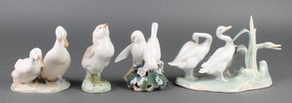 A Royal Copenhagen figure of a chick 5 3/4", ditto 2 doves 5", ditto 2 geese 6", Lladro group of 3 geese 8" 