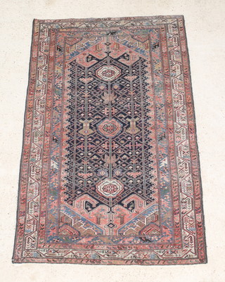 A Persian Malayer rug with blue ground within multi row borders 79" x 50" 