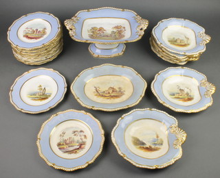 A 19th Century English dessert service with blue and gilt borders enclosing rural landscapes comprising a shaped tazza, serving dish, 7 scalloped dishes and 14 plates 