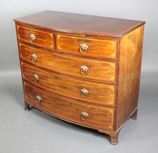 A Georgian mahogany bow front chest of 2 short and 3 long drawers with crossbanding, raised on bracket feet 40 1/2"h x 40"w x 23 1/2"d 