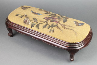 A Victorian oval mahogany show frame footstool raised on cabriole supports, with bead work seat decorated birds amidst branches 5" x 21 1/2" x 9" 