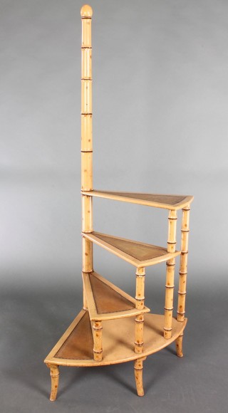A Regency style 4 tread faux bamboo set of spiral library steps 60"h x 19" x 27" (these steps are suitable for decorative purposes only)  