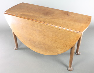 A 19th Century oval mahogany drop flap dining table, raised on club supports 28"h x 40"w x 17 1/2" when closed x 59" when open