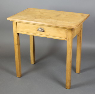 A Victorian rectangular pine side table fitted a drawer and raised on square tapering supports 32"h x 33"w x 21"d 