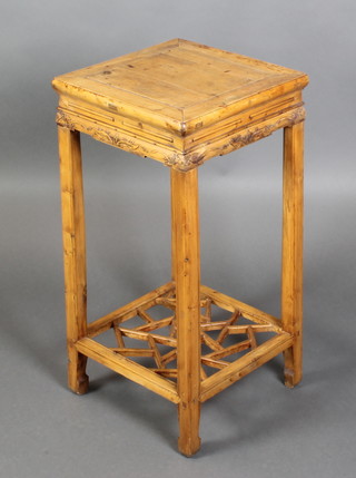 A Chinese light hardwood carved square jardiniere stand with fretwork undertier 30"h x 14 1/2" square