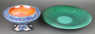 A Grimwade lustre pedestal bowl the blue exterior with orange interior 9", a green glazed Studio shallow bowl 14" 