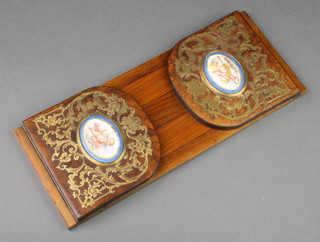 A pair of Victorian walnut and gilt mounted expanding book ends, the ends set 2 "Sevres" blue porcelain panels decorated cherubs 4 1/2"h x 15"w and 23" when extended 