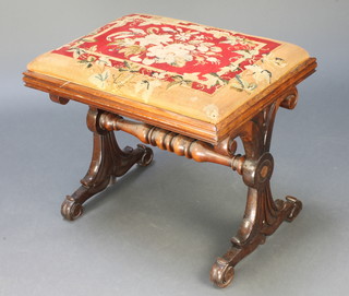 A Victorian rectangular rosewood stool raised on carved shaped supports with upholstered drop in seat 16" x 20" x 15" 