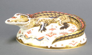 A Royal Crown Derby Japan pattern paperweight in the form of a crocodile with gold stopper 6 1/2" 