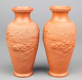 A pair of tanware oviform vases decorated with dragons chasing the flaming pearl 6" 