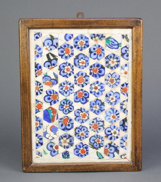 A framed panel of mosaic Persian tile segments 20" x 7" 