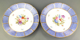 A pair of 19th Century Spode cabinet plates with blue and gilt basket weave rim enclosing spring flowers no. 1182 10" 