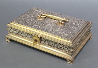 A Continental Gothic style rectangular steel and gilt finished strong box with hinged lid, raised on pierced bracket feet 11" x 7 1/2" 