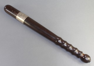 A turned lignum vitae presentation Police truncheon marked S338 and with silver band marked Presented to Sub Inspector J J Moody on his retirement from the M.S.C.R. 1932 by the officers and men of West Hampstead Station 